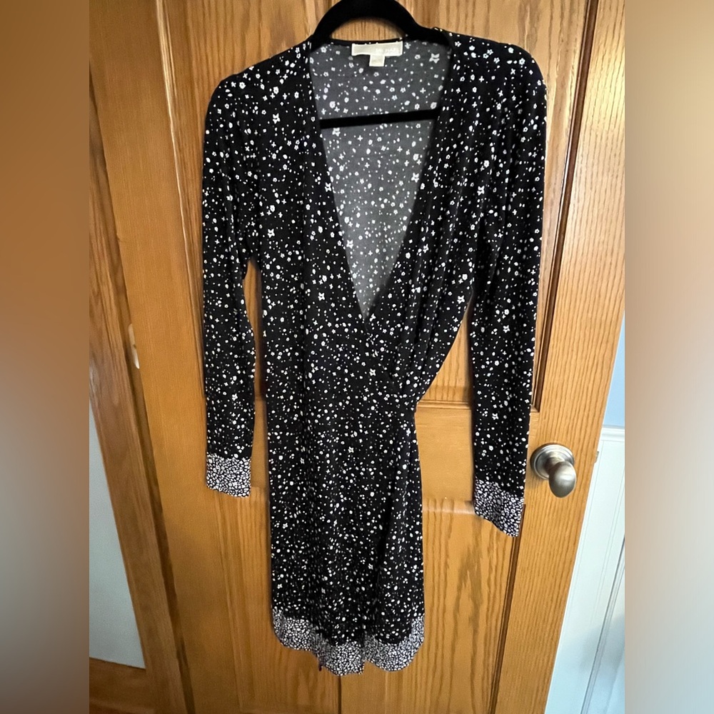 Michael Kors Black stars and planet patterned wrap dress. Size small.